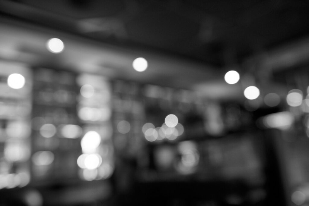 A black and white abstract photograph, with many hues in between, meant to represent the layers and depths of news.